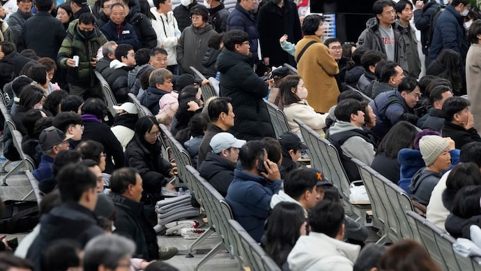 Relatives of passengers gather at Muan International Airport in Muan, South Korea. 